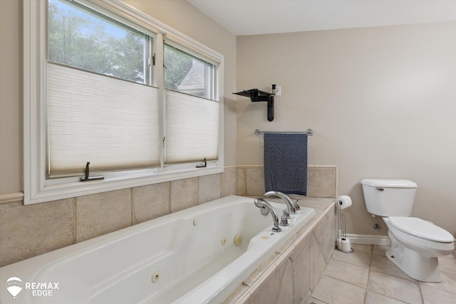 7266 Dodge Rd, Montrose, MI 48457 - full bathroom with a tub with jets and tile patterned floors