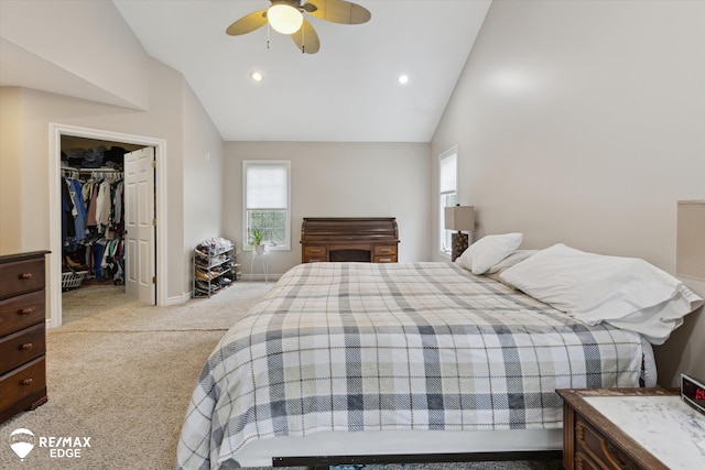 7266 Dodge Rd, Montrose, MI 48457 - carpeted bedroom featuring vaulted ceiling, a walk in closet, recessed lighting, ceiling fan, and a closet