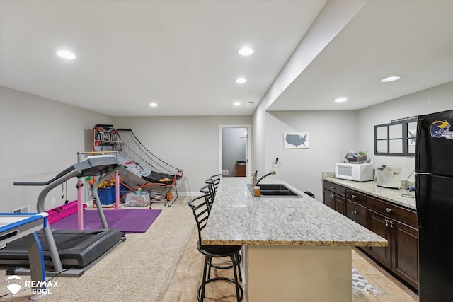 7266 Dodge Rd, Montrose, MI 48457 - exercise room featuring recessed lighting, light carpet, and light tile patterned floors