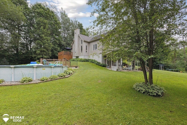 7266 Dodge Rd, Montrose, MI 48457 - view of grassy yard featuring an outdoor pool