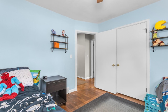 723 S Bowen St, Jackson, MI 49203 - bedroom featuring wood finished floors and ceiling fan