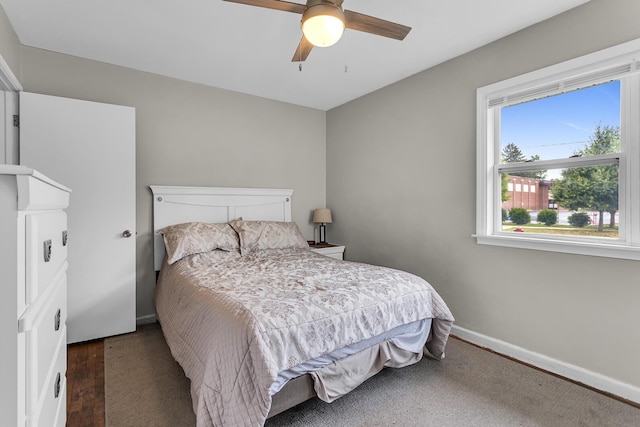 723 S Bowen St, Jackson, MI 49203 - bedroom featuring ceiling fan and wood finished floors