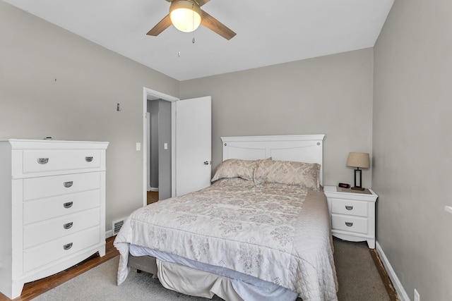 723 S Bowen St, Jackson, MI 49203 - bedroom featuring baseboards and a ceiling fan