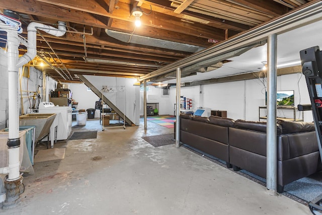 723 S Bowen St, Jackson, MI 49203 - unfinished basement with washing machine and dryer