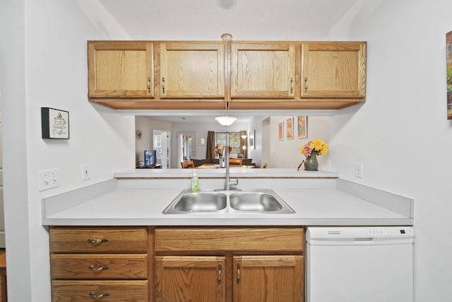 824 W Barrington Cir, Jackson, MI 49203 - kitchen featuring white dishwasher and light countertops