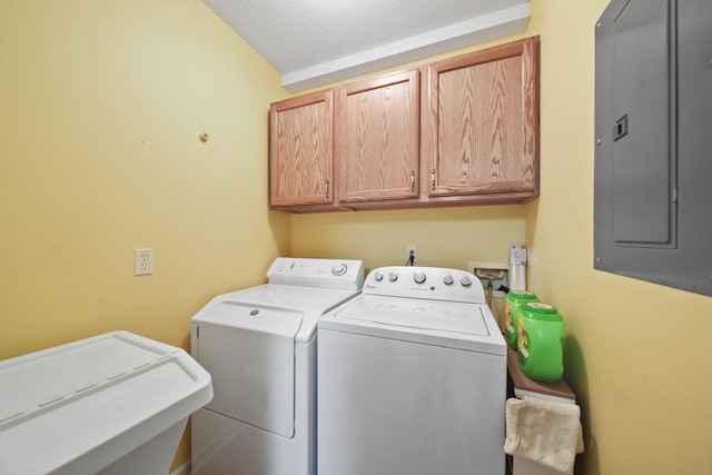 824 W Barrington Cir, Jackson, MI 49203 - washroom with electric panel, washer and dryer, cabinet space, and a textured ceiling
