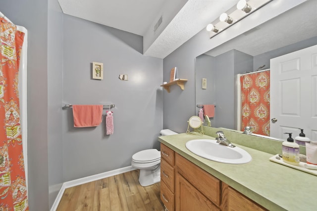 824 W Barrington Cir, Jackson, MI 49203 - bathroom featuring vanity, wood finished floors, and curtained shower