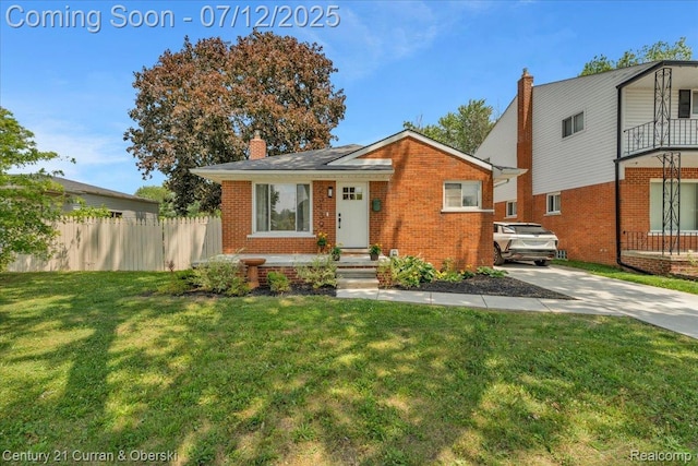 23139 Deziel St, Saint Clair Shores, MI 48082 - view of front of property with brick siding and a chimney