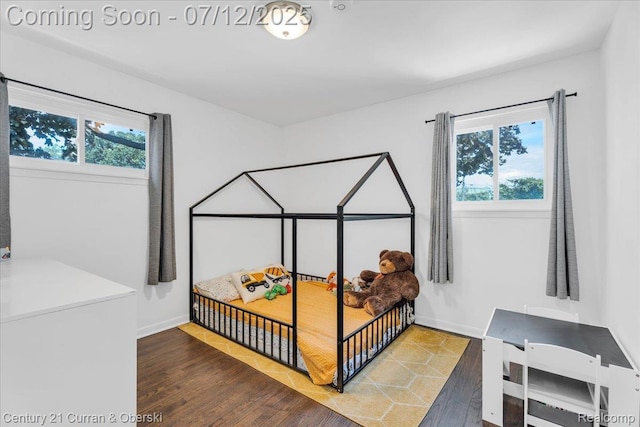 23139 Deziel St, Saint Clair Shores, MI 48082 - bedroom with wood finished floors and baseboards