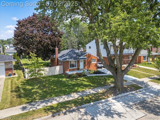 23139 Deziel St, Saint Clair Shores, MI 48082 - view of front of house featuring brick siding and a chimney