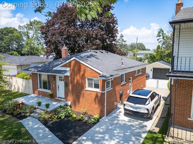23139 Deziel St, Saint Clair Shores, MI 48082 - view of front of house with brick siding, a chimney, a garage, and roof with shingles
