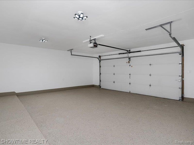 37305 Maas Dr, Sterling Heights, MI 48312 - garage featuring a garage door opener