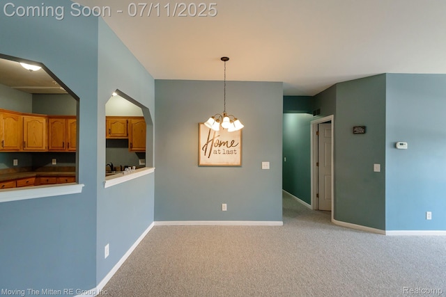231 Main St, Belleville, MI 48111 - unfurnished dining area featuring light colored carpet, arched walkways, and a chandelier