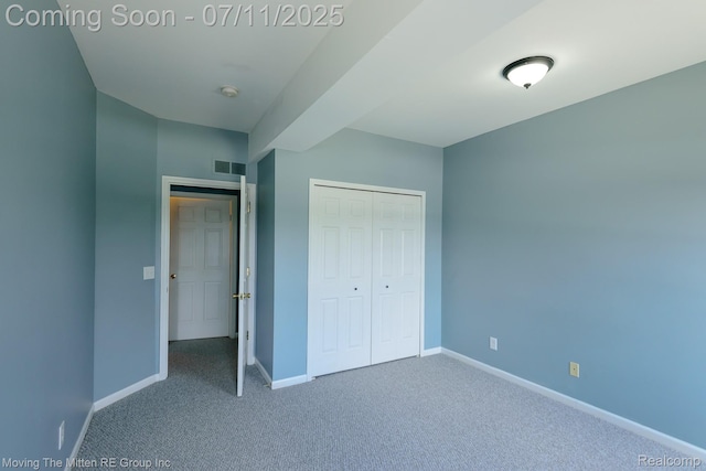 231 Main St, Belleville, MI 48111 - unfurnished bedroom featuring carpet floors and a closet