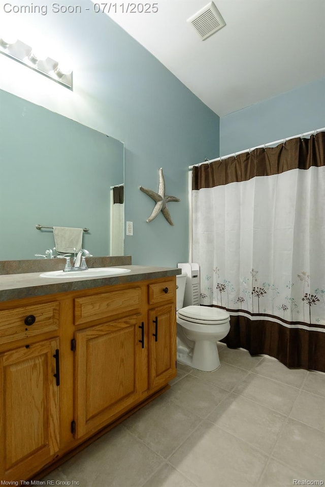 231 Main St, Belleville, MI 48111 - bathroom with tile patterned flooring, vanity, and a shower with shower curtain
