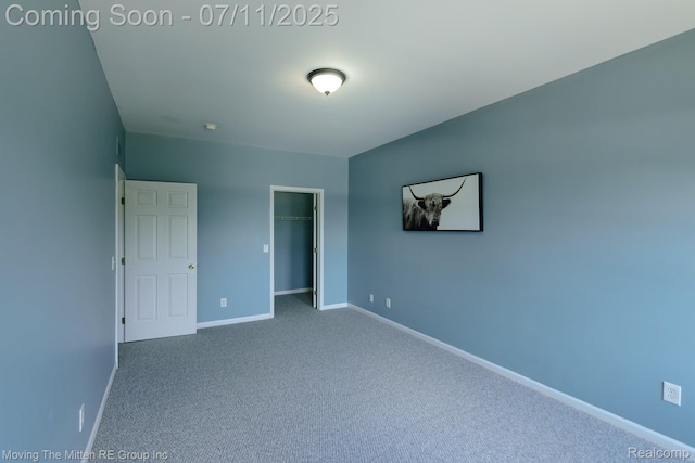231 Main St, Belleville, MI 48111 - unfurnished bedroom featuring carpet and a spacious closet