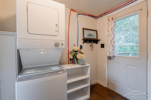 1312 Bayliss St, Midland, MI 48640 - laundry area with stacked washing machine and dryer and dark wood-style floors