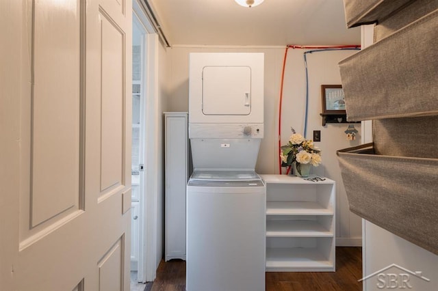 1312 Bayliss St, Midland, MI 48640 - laundry room with stacked washer / drying machine and dark wood-style flooring