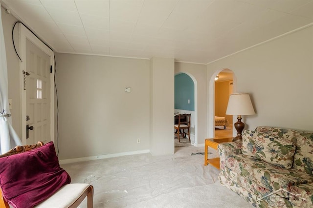 1312 Bayliss St, Midland, MI 48640 - sitting room with arched walkways and carpet