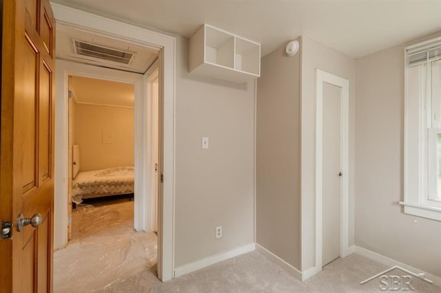 1312 Bayliss St, Midland, MI 48640 - unfurnished bedroom featuring baseboards and attic access