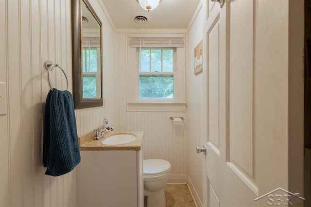 1312 Bayliss St, Midland, MI 48640 - bathroom with vanity and toilet
