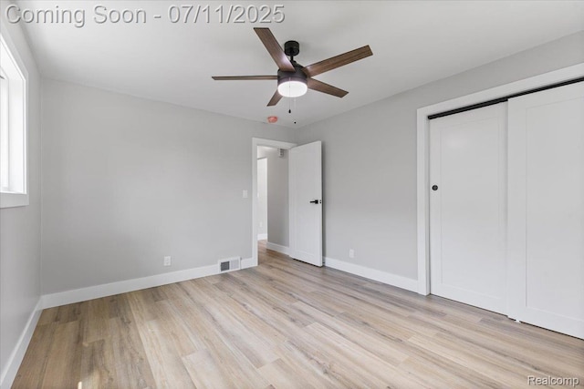 22700 Garfield St, Saint Clair Shores, MI 48082 - unfurnished bedroom with light wood-style floors, a closet, and a ceiling fan