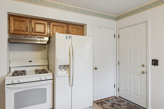 5452 Lucerne Ave, Kalamazoo, MI 49048 - kitchen with white appliances, under cabinet range hood, and brown cabinets
