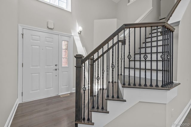 4350 Pine Ridge Ct, Ann Arbor, MI 48105 - foyer entrance with plenty of natural light, wood finished floors, stairs, and a high ceiling