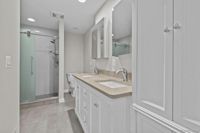 4350 Pine Ridge Ct, Ann Arbor, MI 48105 - full bathroom with a stall shower, double vanity, tile patterned flooring, and recessed lighting