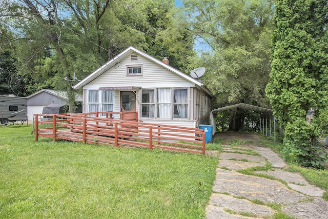 100 Eldred St, Battle Creek, MI 49015 - bungalow featuring a carport
