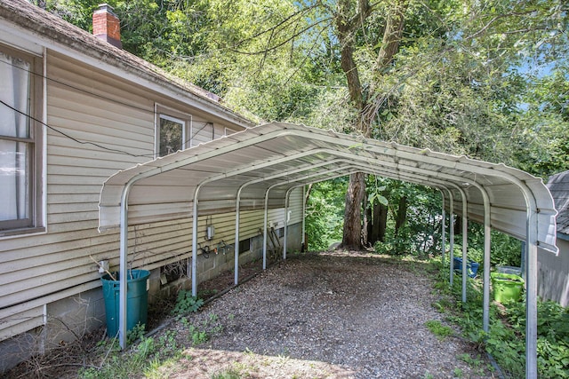 100 Eldred St, Battle Creek, MI 49015 - view of parking / parking lot featuring a detached carport