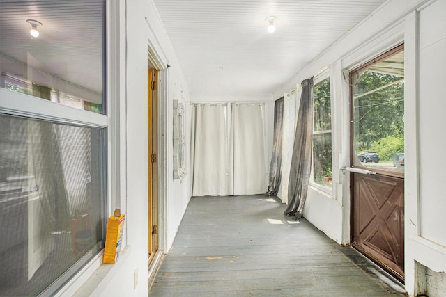 100 Eldred St, Battle Creek, MI 49015 - unfurnished sunroom featuring hardwood / wood-style flooring