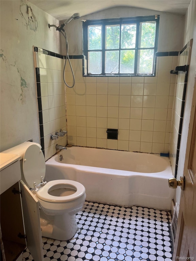 15682 Liberal St, Detroit, MI 48205 - full bath featuring healthy amount of natural light, tile patterned flooring, bathtub / shower combination, and vanity