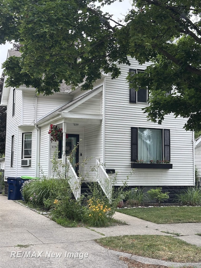 419 N Birney St, Bay City, MI 48708 - obstructed view of property with a porch and cooling unit