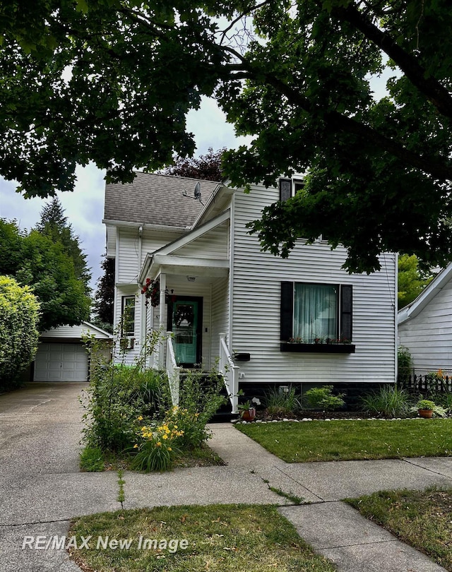 419 N Birney St, Bay City, MI 48708 - view of front of home featuring an outbuilding and a detached garage