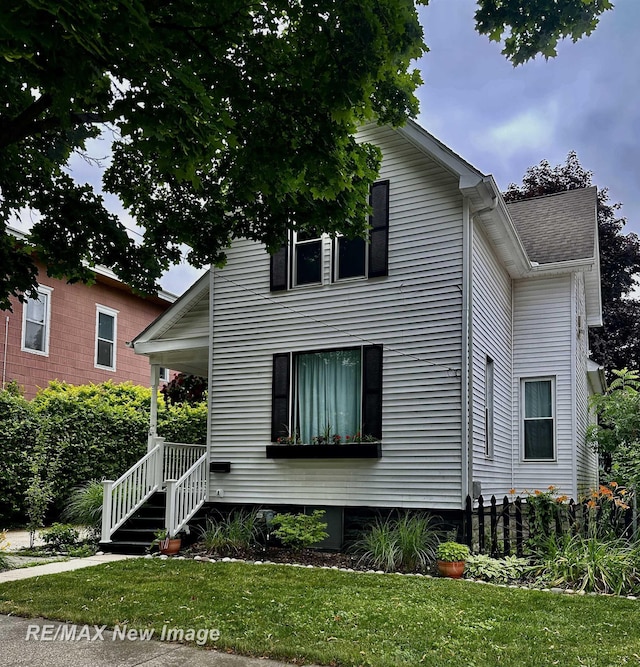 419 N Birney St, Bay City, MI 48708 - view of front of house featuring a front yard