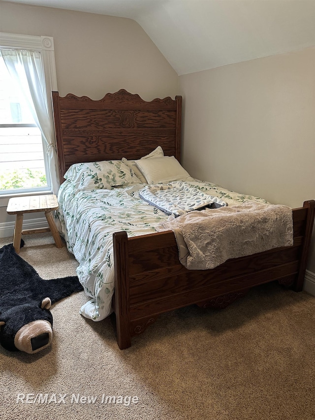 419 N Birney St, Bay City, MI 48708 - carpeted bedroom featuring lofted ceiling