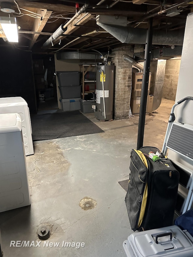 419 N Birney St, Bay City, MI 48708 - unfinished basement with gas water heater, separate washer and dryer, and heating unit