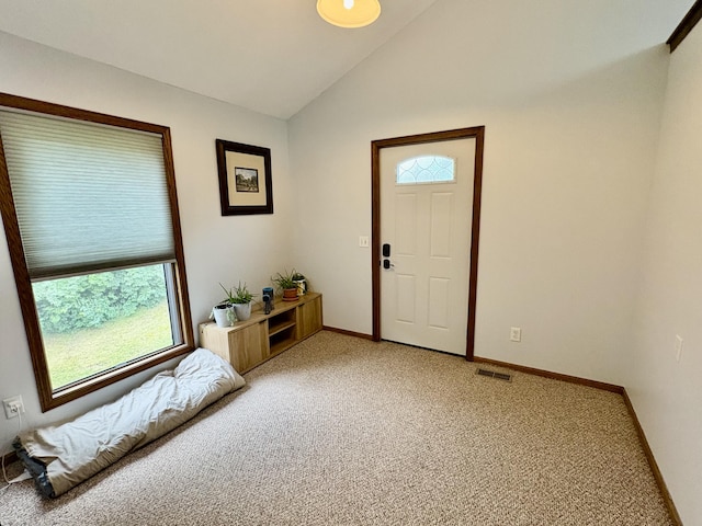 12141 Lawrence Rd, Brooklyn, MI 49230 - entryway featuring lofted ceiling and light carpet