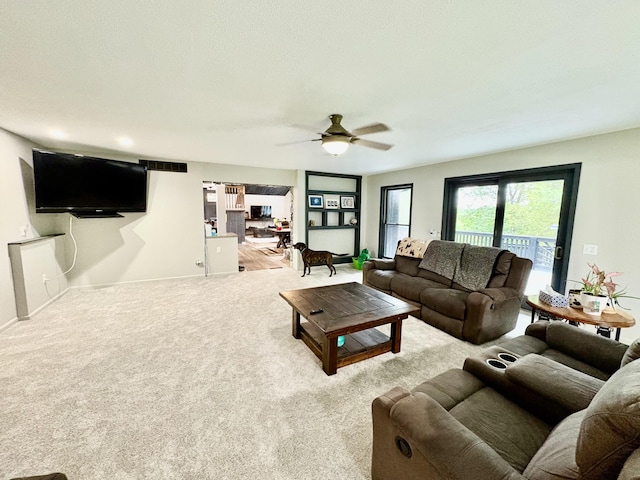 12141 Lawrence Rd, Brooklyn, MI 49230 - living room with ceiling fan and carpet