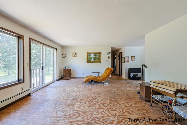 2860 Fenner Rd, Muskegon, MI 49445 - living area featuring baseboard heating