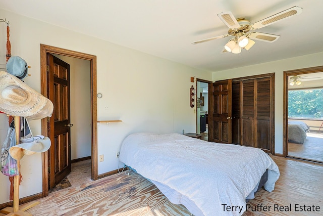 2860 Fenner Rd, Muskegon, MI 49445 - bedroom with wood finished floors, access to outside, a ceiling fan, and a closet