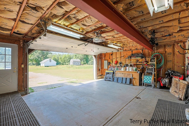 2860 Fenner Rd, Muskegon, MI 49445 - garage with a garage door opener