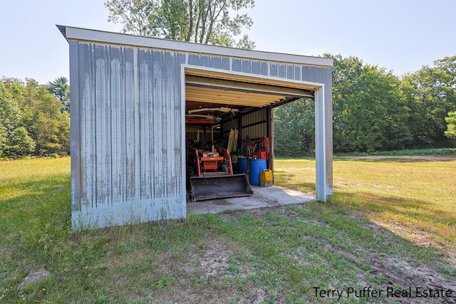 2860 Fenner Rd, Muskegon, MI 49445 - view of pole building featuring a lawn