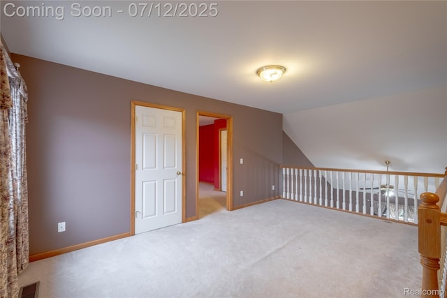 1435 Sunset Blvd, Flint, MI 48507 - additional living space with carpet floors and lofted ceiling