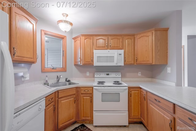1435 Sunset Blvd, Flint, MI 48507 - kitchen featuring white appliances and light countertops