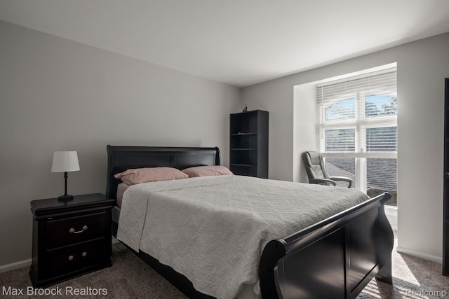 1125 Meadowglen Ct, Bloomfield Hills, MI 48304 - bedroom featuring dark carpet and baseboards