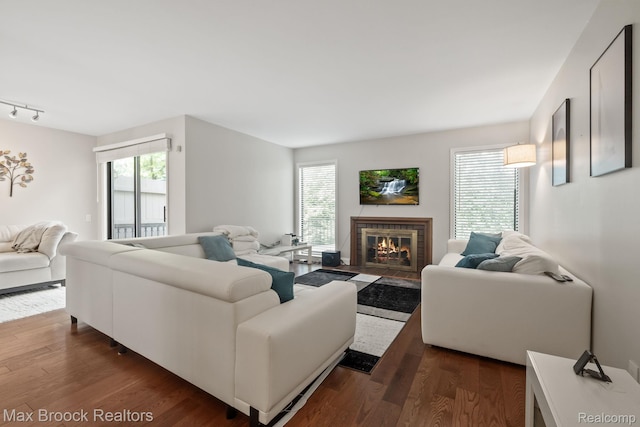 1125 Meadowglen Ct, Bloomfield Hills, MI 48304 - living area with dark wood-type flooring, healthy amount of natural light, and rail lighting
