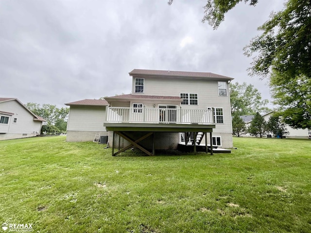 1421 Newcastle Dr, Davison, MI 48423 - rear view of property featuring a wooden deck, a lawn, and stairway