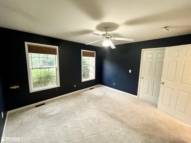 1421 Newcastle Dr, Davison, MI 48423 - unfurnished bedroom with carpet and ceiling fan